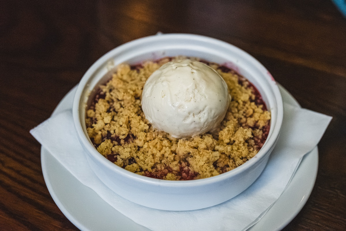 Summer fruit crumble with vanilla ice cream