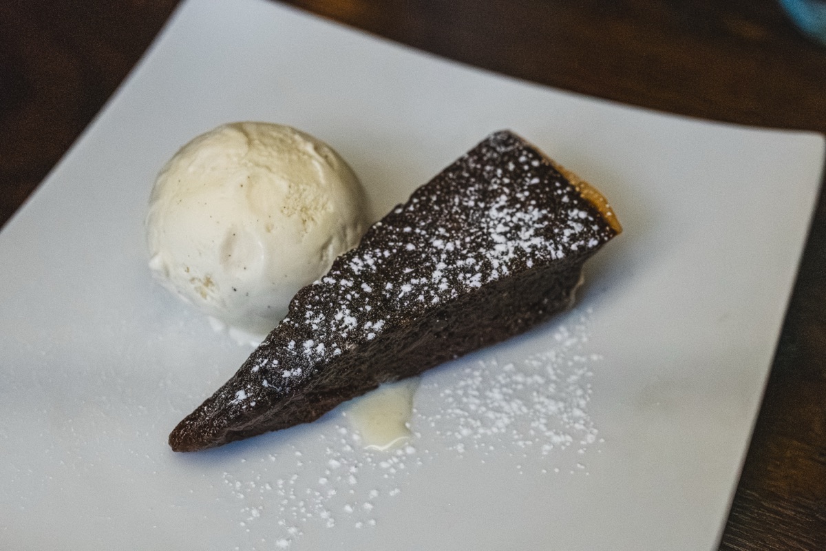 Dark chocolate tart with vanilla ice cream